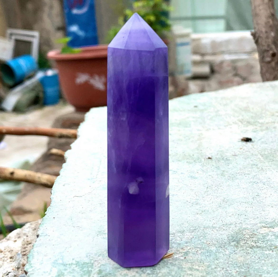 Natural purple fluorite gemstone tower point aura wand