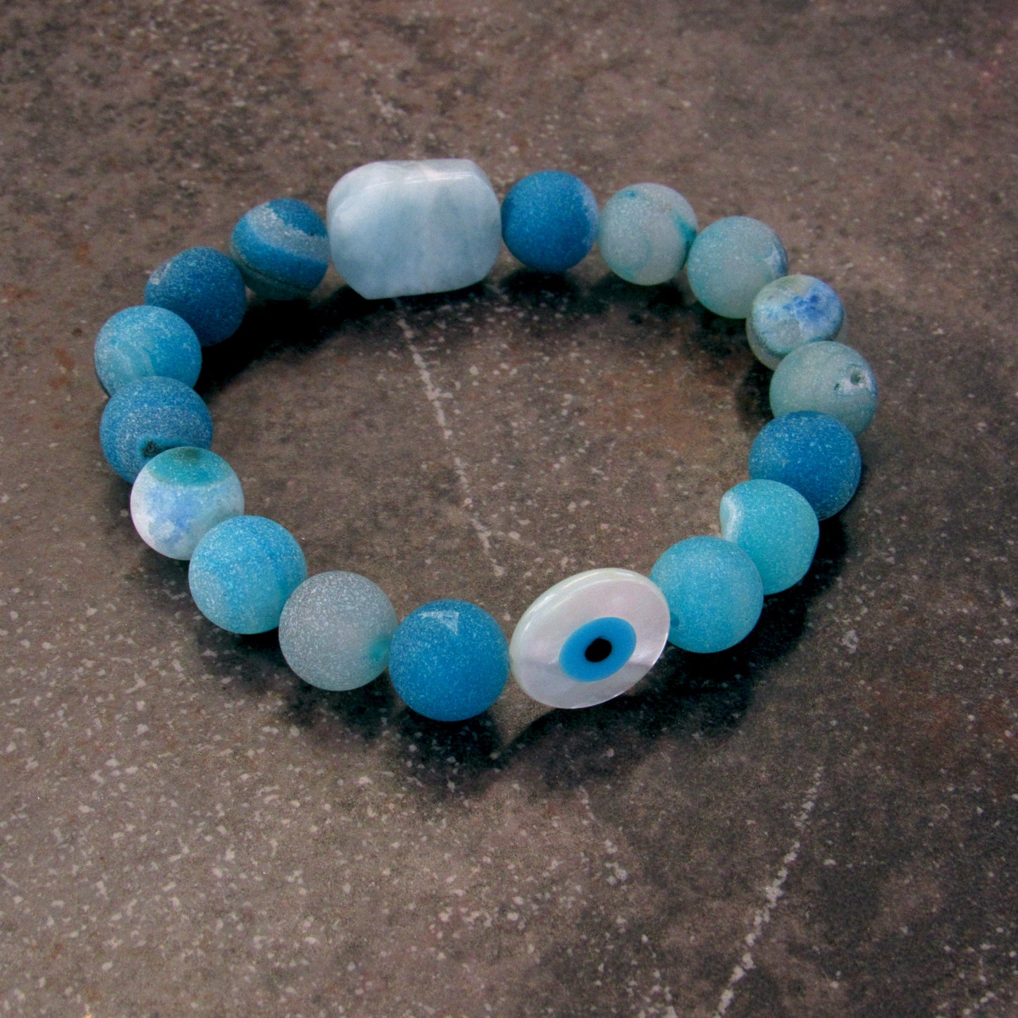 Blue Agates, Aquamarine gemstone, and mother of Pearl Evil Eye Bracelet